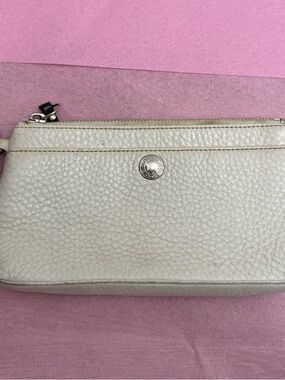 Coach Pebbled Leather Wristlet Clutch in Off-White